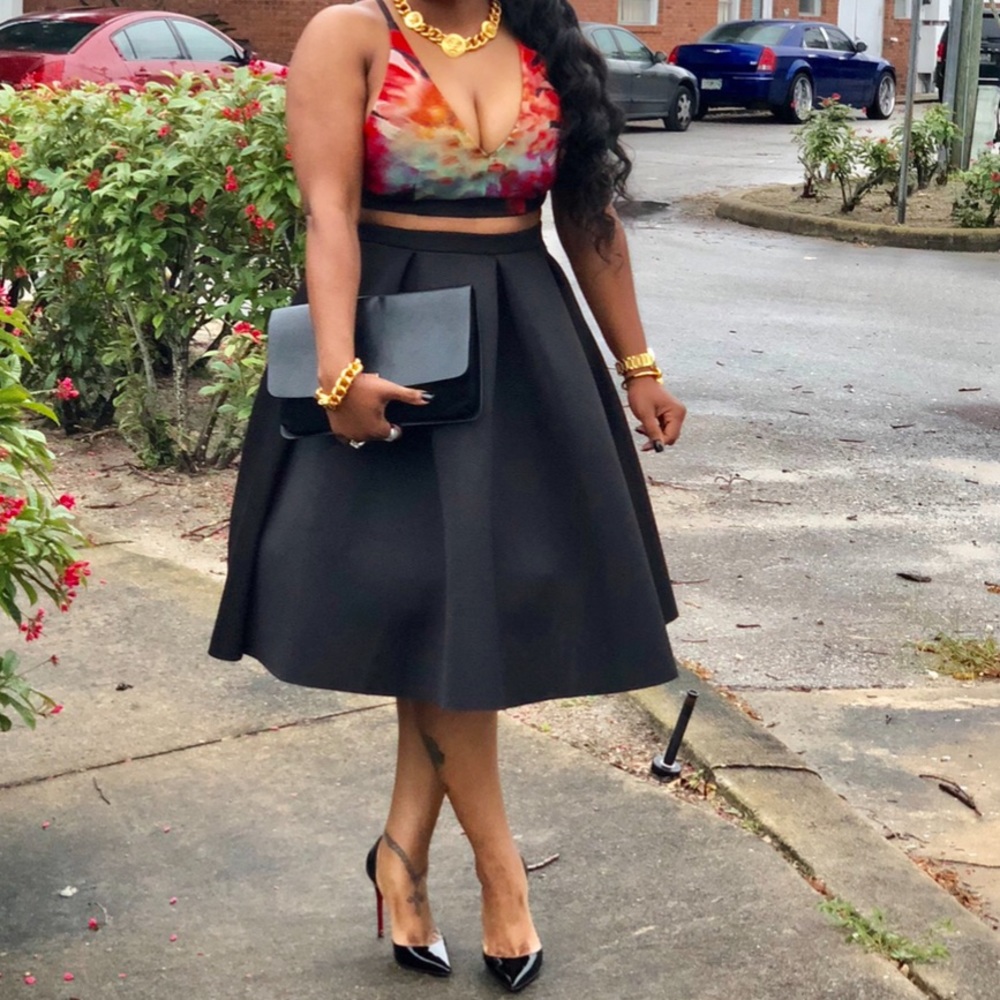 Black skirt top sold separately